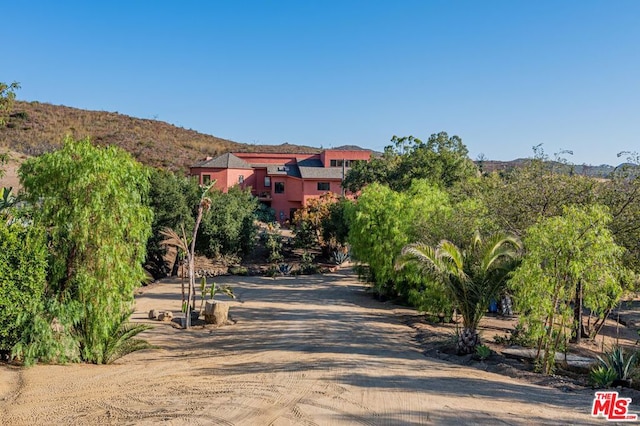 exterior space featuring a mountain view