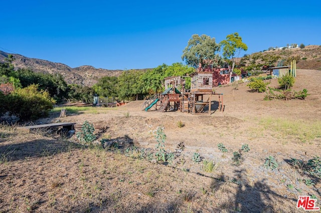 exterior space featuring a mountain view