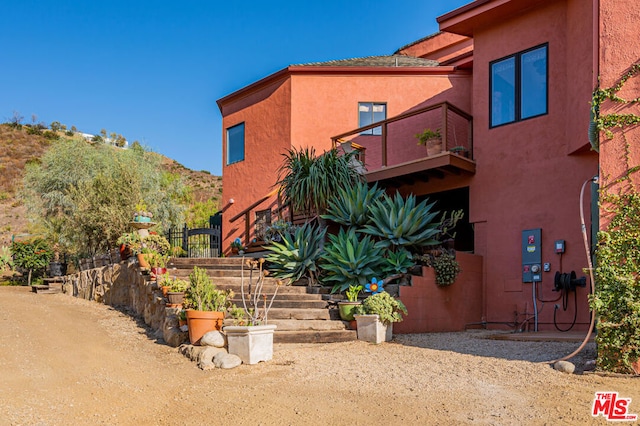 exterior space featuring a mountain view