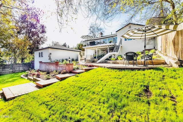 rear view of house with a lawn