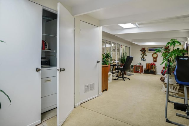 office space with visible vents and washer / clothes dryer