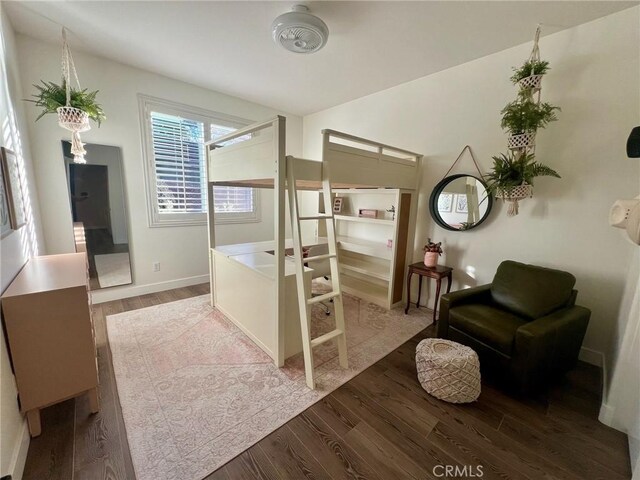 bedroom with wood-type flooring