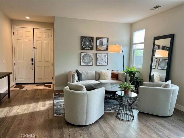 living room with hardwood / wood-style floors