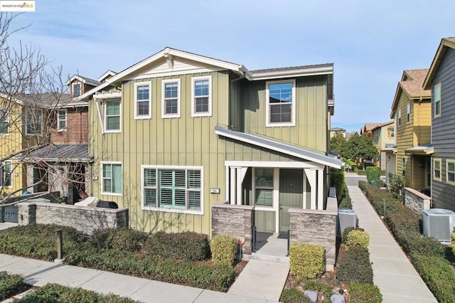 view of front of home with cooling unit