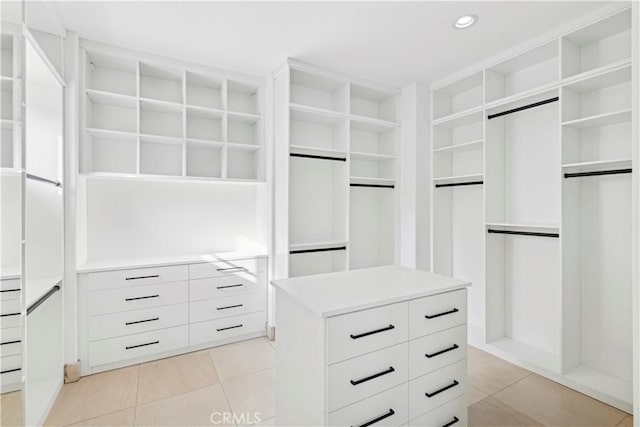 walk in closet featuring light tile patterned floors