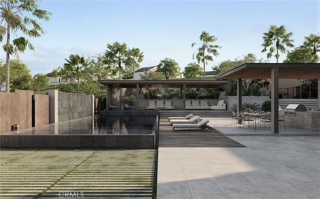 view of patio with an outdoor kitchen