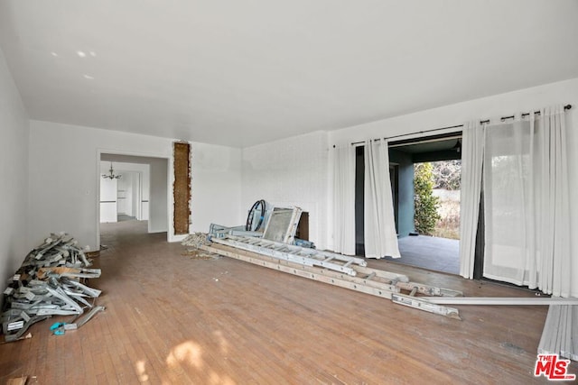 unfurnished living room featuring wood-type flooring