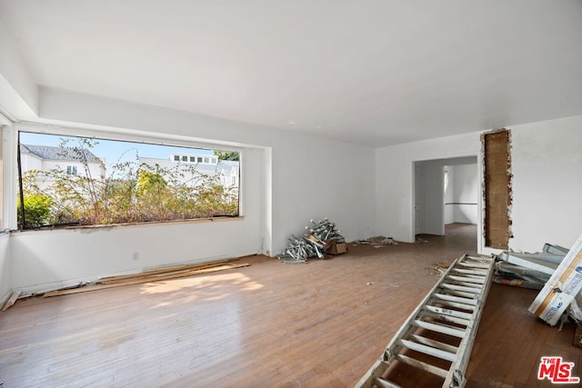 interior space with hardwood / wood-style flooring