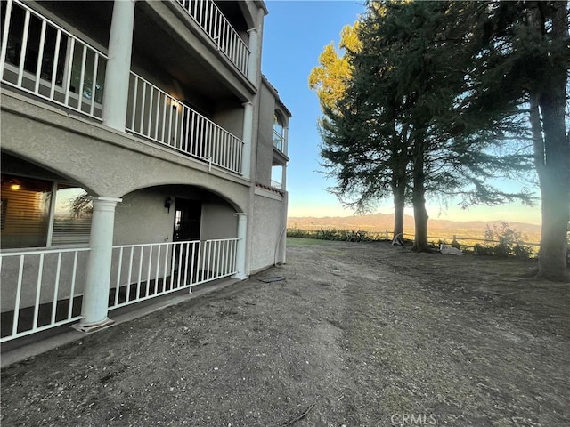 view of property exterior at dusk