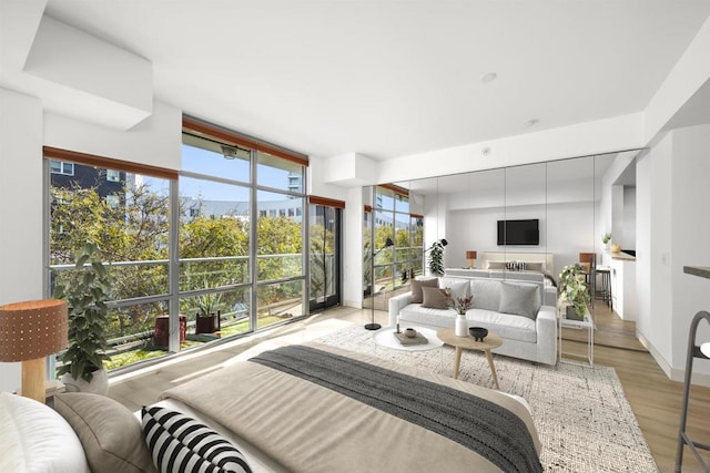 bedroom with light wood-type flooring