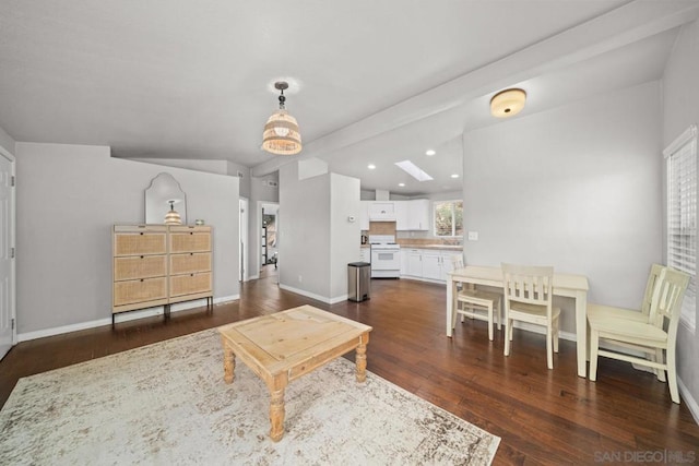 living room featuring sink, dark hardwood / wood-style floors, and beamed ceiling