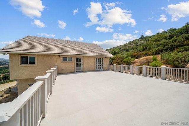 back of property with a patio area