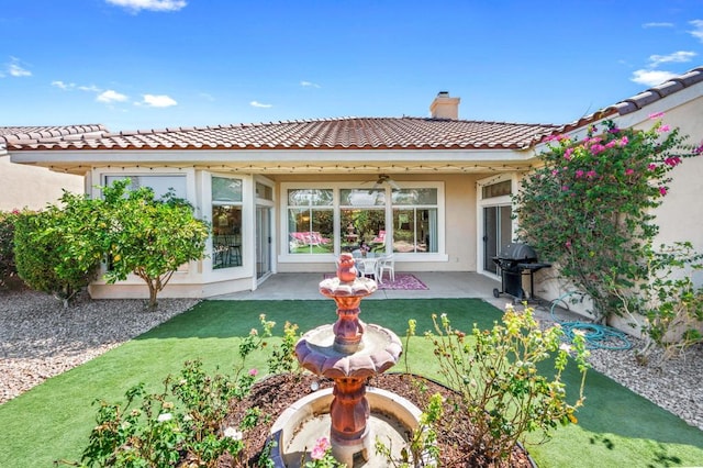 rear view of house featuring a patio area