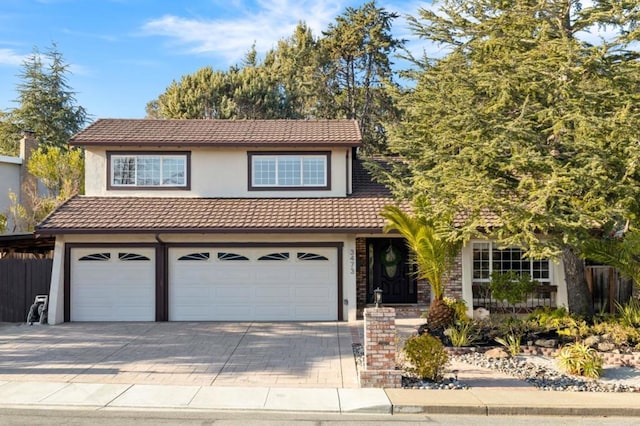 view of front of home featuring a garage