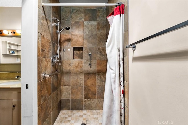 bathroom featuring vanity and a shower with shower curtain