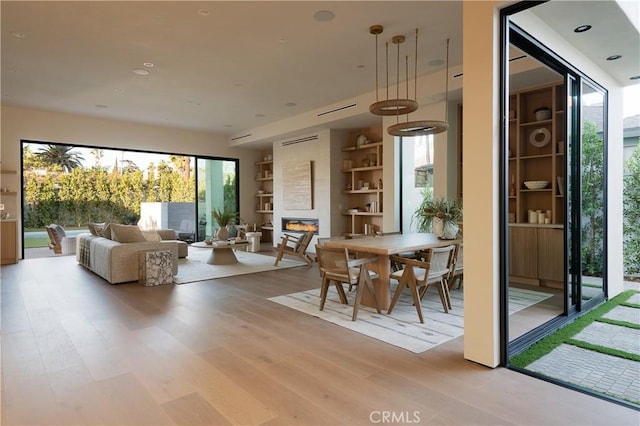 dining area with light wood-type flooring