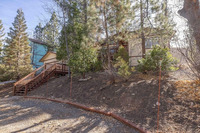 view of playground featuring a wooden deck