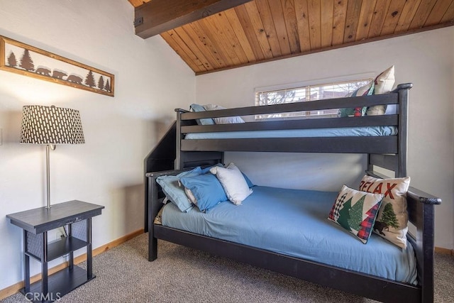 carpeted bedroom with vaulted ceiling with beams and wooden ceiling