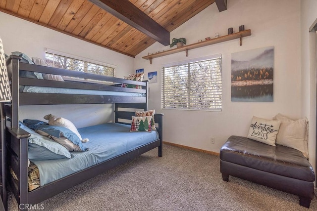 carpeted bedroom with wooden ceiling, multiple windows, and vaulted ceiling with beams