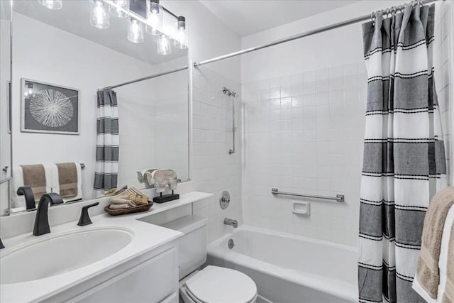 full bathroom with shower / bathtub combination with curtain, vanity, and toilet