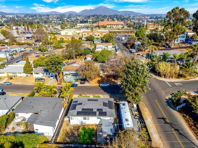 drone / aerial view featuring a mountain view