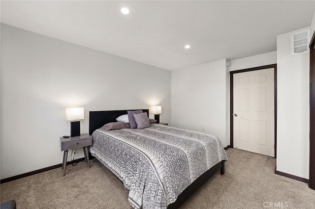 bedroom featuring recessed lighting, baseboards, light colored carpet, and visible vents