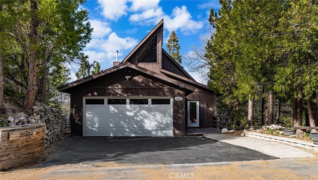 garage featuring driveway