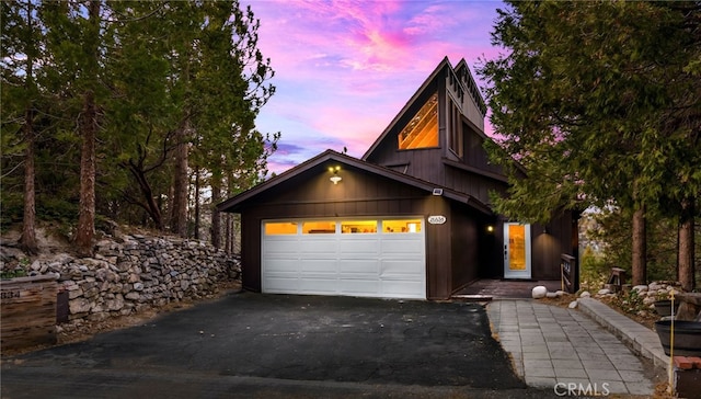 view of front of property with a garage