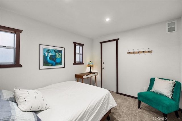 carpeted bedroom featuring visible vents and recessed lighting