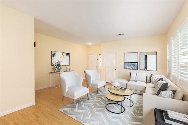 living room with light hardwood / wood-style floors