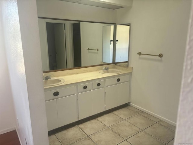 bathroom with vanity and tile patterned floors