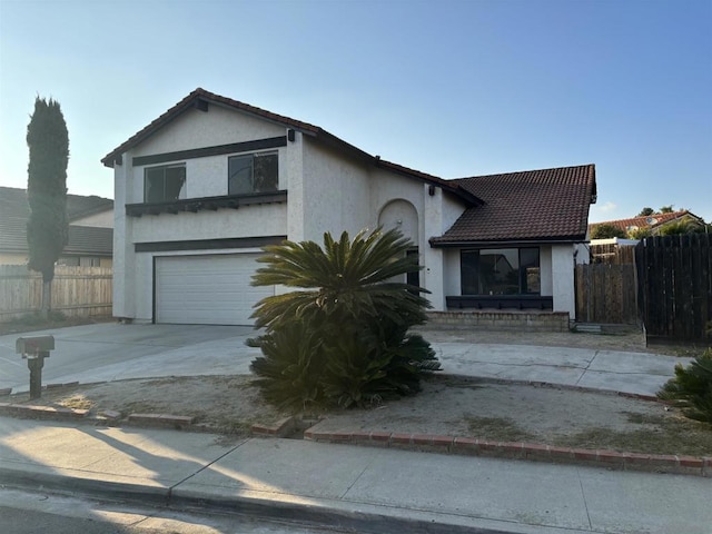 view of front of property with a garage