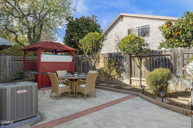 view of patio / terrace featuring a gazebo and central AC