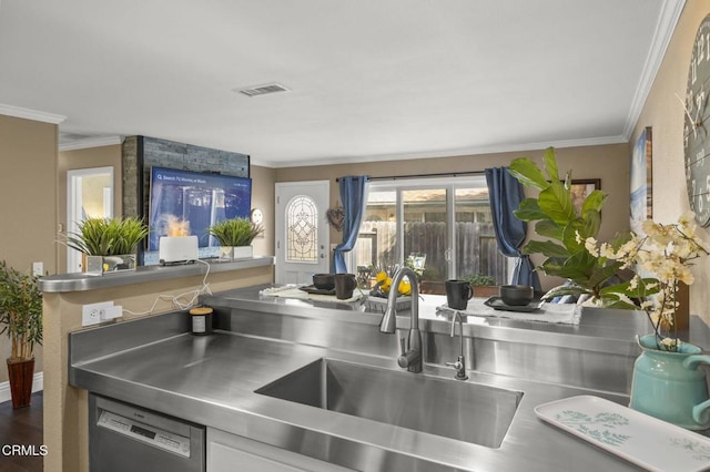 kitchen with sink, ornamental molding, dishwasher, and stainless steel counters