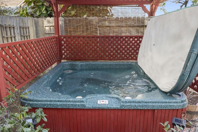 view of patio / terrace featuring a hot tub