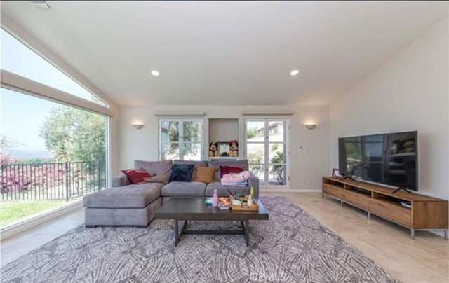 living room with vaulted ceiling