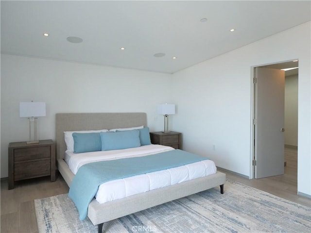 bedroom featuring light hardwood / wood-style flooring