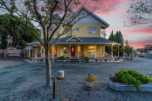 farmhouse inspired home featuring a porch