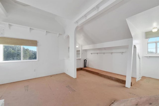 bonus room featuring lofted ceiling