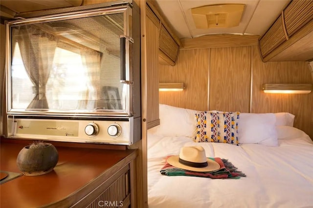 bedroom featuring vaulted ceiling