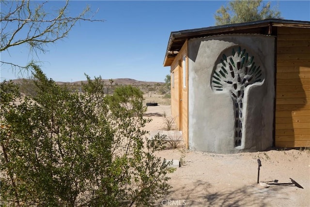 exterior details with a mountain view