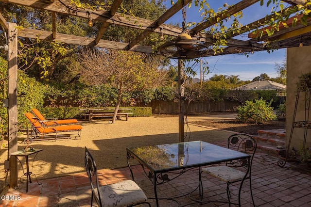 view of patio featuring a pergola