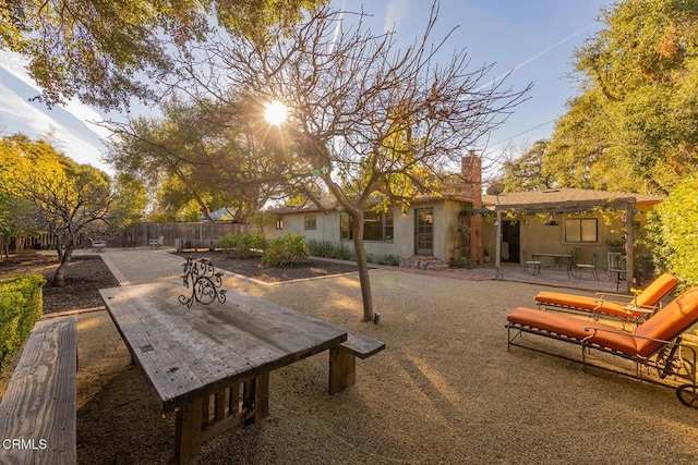 rear view of property featuring a patio