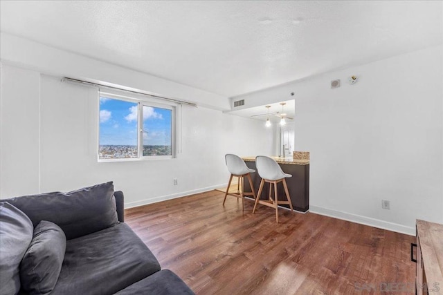 living room with dark wood-type flooring