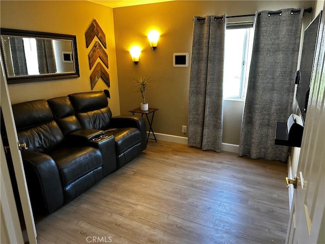 living room with light hardwood / wood-style floors