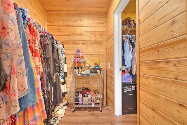 spacious closet featuring hardwood / wood-style floors