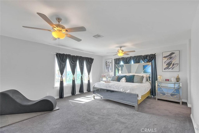 bedroom featuring ceiling fan and carpet floors