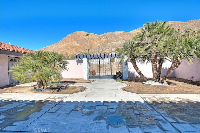 view of patio / terrace featuring a mountain view