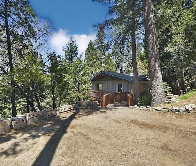 view of front of home with a wooden deck