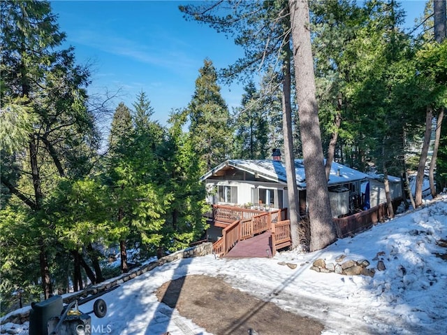 view of front of home with a wooden deck